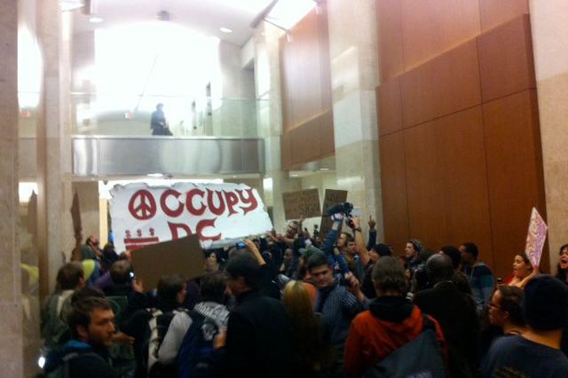 Occupy D.C. protesters briefly stormed a building owned by Brookfield Properties.
